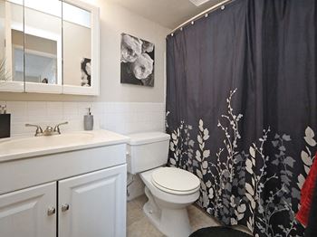 Upgraded bathrooms with new 12 inch ceramic tile flooring